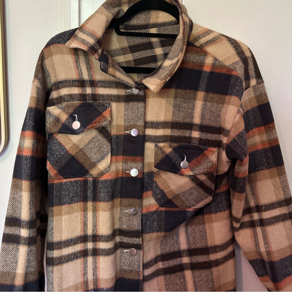 Cute vintage looking flannel. Very comfortable